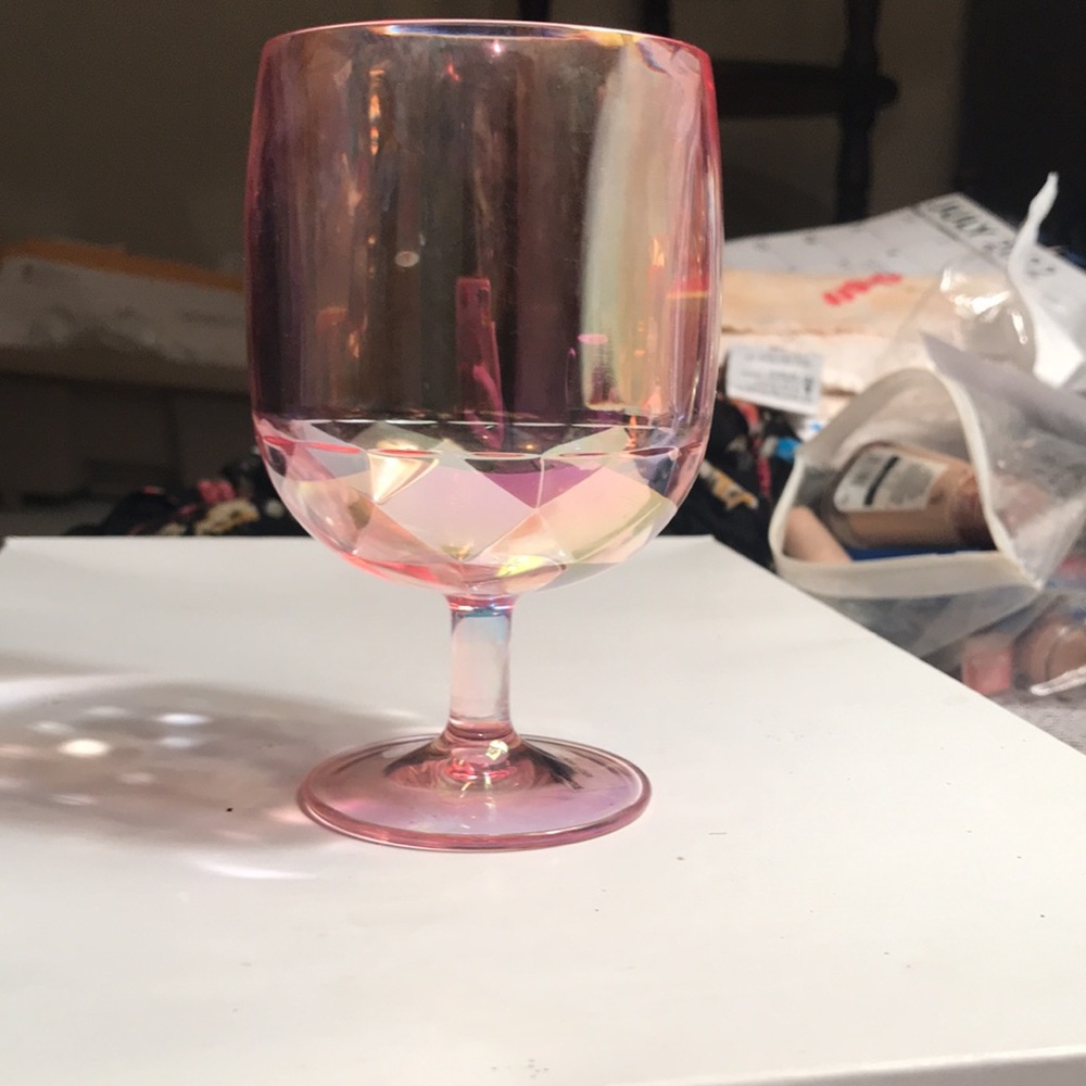 Light pink dimensional bottom drink glass.